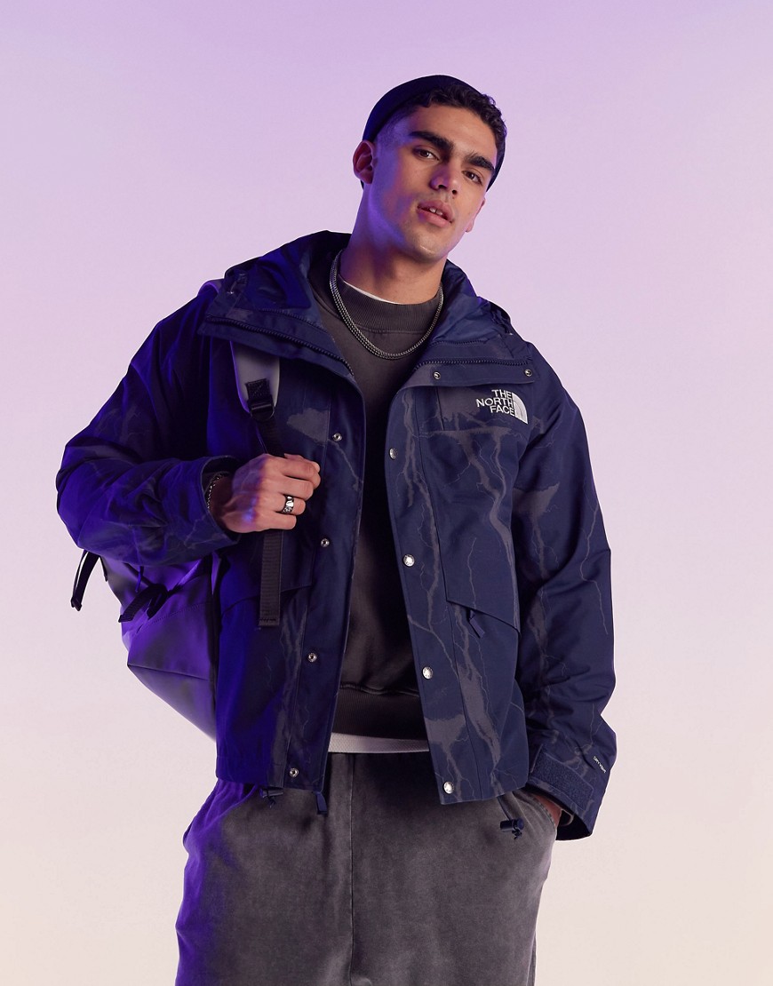 The North Face Mountain jacket in blue reflective lightning print