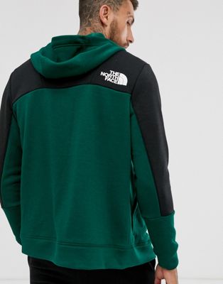 green north face zip up hoodie