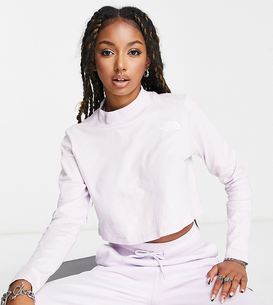 The North Face Nekku high neck cropped long sleeve top in lilac Exclusive at ASOS-Purple