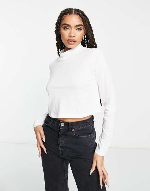 The North Face – Nekku – Hochgeschlossenes, langärmliges Oberteil in Weiß mit kurzem Schnitt, exklusiv bei ASOS