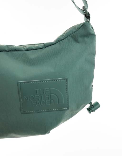 The North Face Never Stop cross body bag in green, 2 of 4