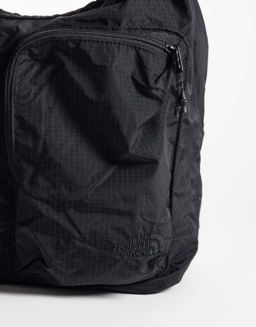 The North Face Never Stop crossbody-väska i svart, 3 av 4