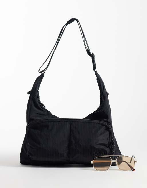 The North Face Never Stop crossbodytas in zwart, 2 van 4