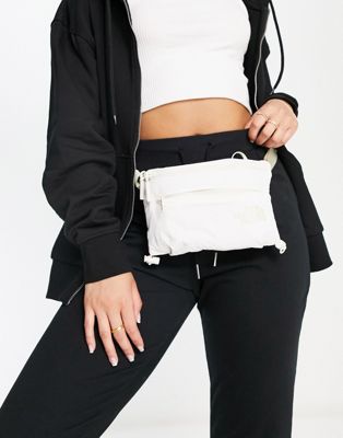 The North Face Never Stop Lumbar cross body bag in white