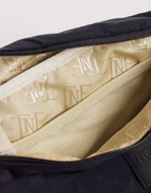 The North Face - Never Stop Lumbar - Crossbody heuptas in zwart, 3 van 4