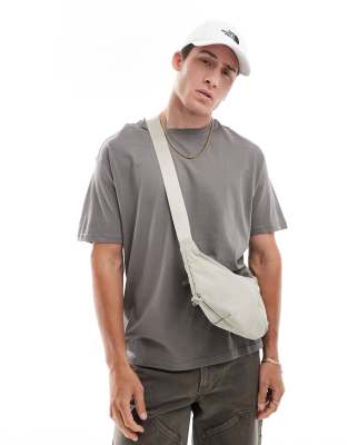 Never Stop sling cross body bag in clay gray