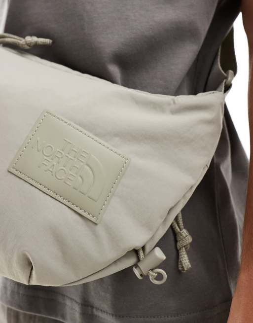 The North Face Never Stop sling cross body bag in clay gray, 3 of 4