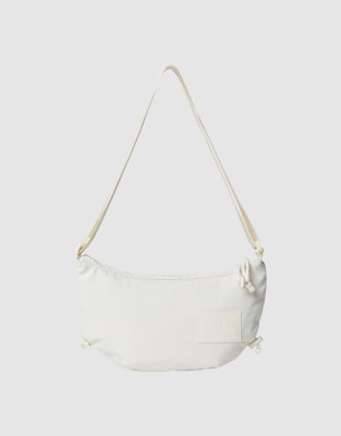 The North Face - Never Stop - Umhängetasche in White Dune-Weiß
