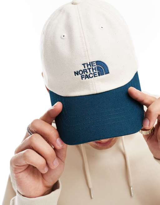 The North Face Norm logo baseball cap in off white and navy ASOS