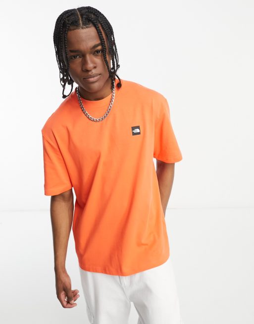 The North Face NSE back graphic heavyweight oversized T shirt in orange ASOS