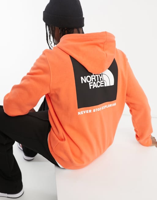 The North face NSE box print logo hoodie in orange 
