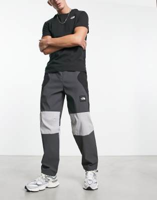 The North Face NSE Carduelis track pants in black and grey - ASOS Price Checker
