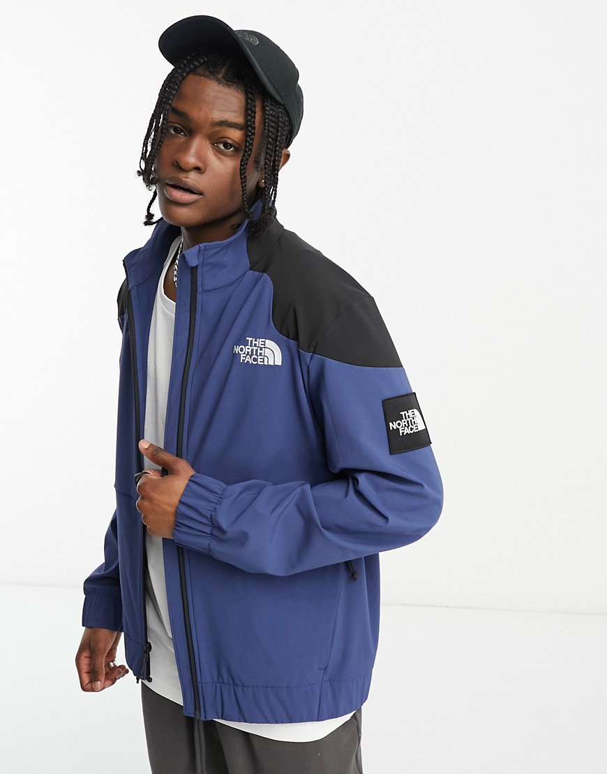 The North Face NSE Carduelis zip up softshell track jacket in navy and black
