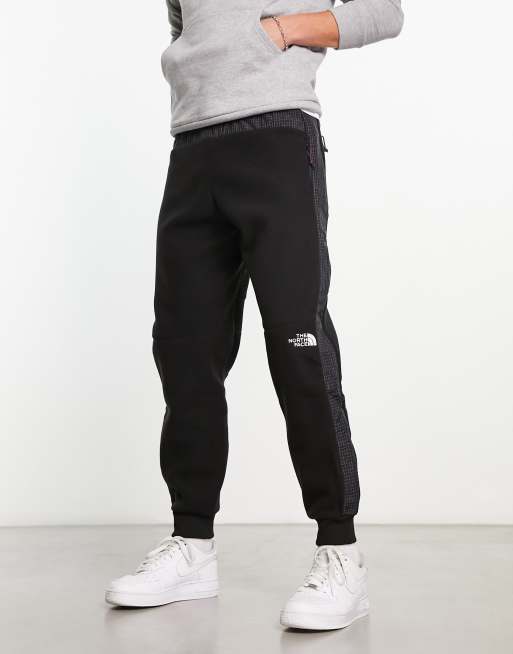 The North Face NSE Convin microfleece joggers in black | ASOS