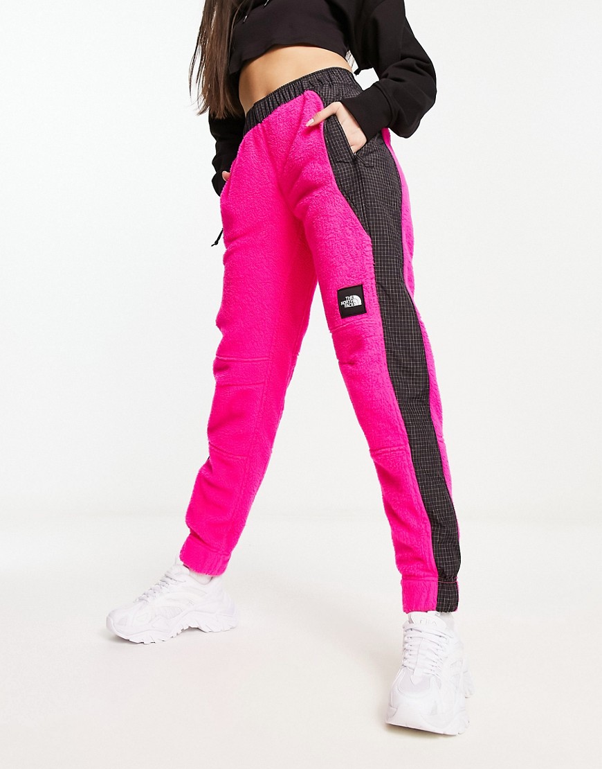 The North Face NSE Convin microfleece joggers in bright pink