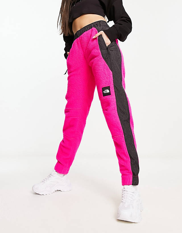 The North Face - nse convin microfleece joggers in bright pink