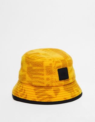 The North Face NSE Fleeski fleece bucket hat in yellow geo print - ASOS Price Checker
