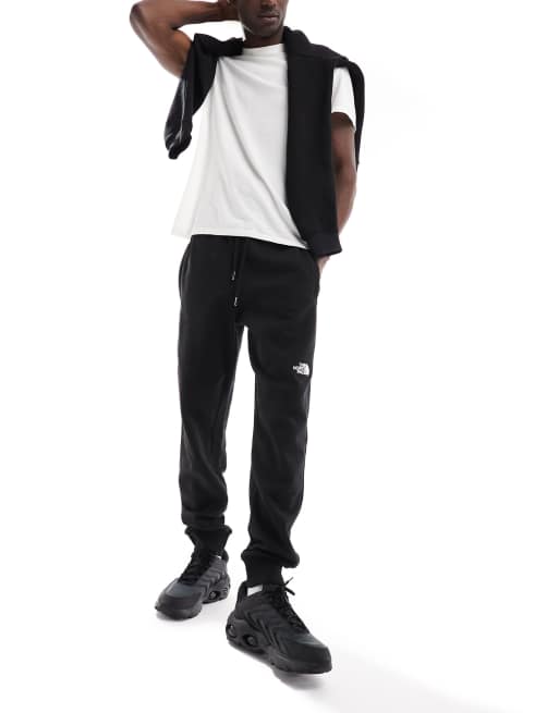 The North Face Tight sweatpants in black Exclusive at ASOS