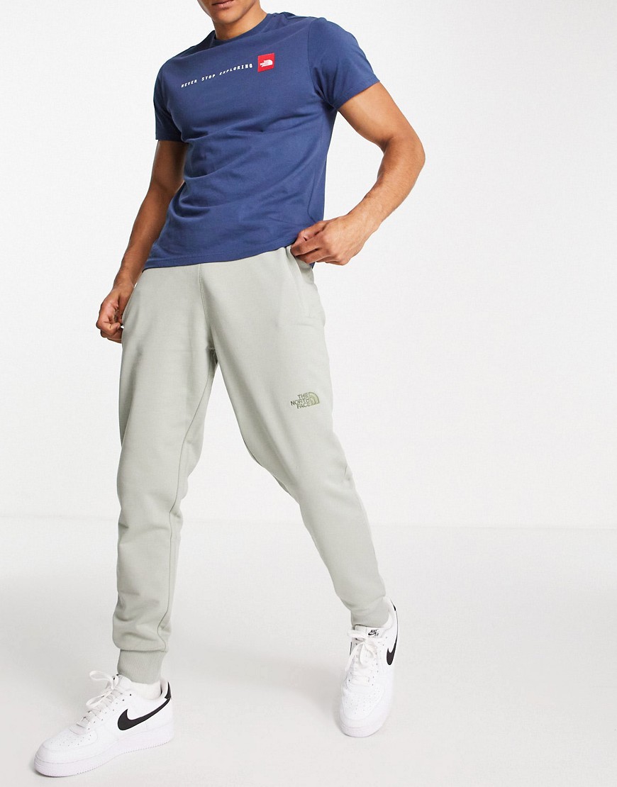 The North Face NSE Light sweatpants in gray-Grey