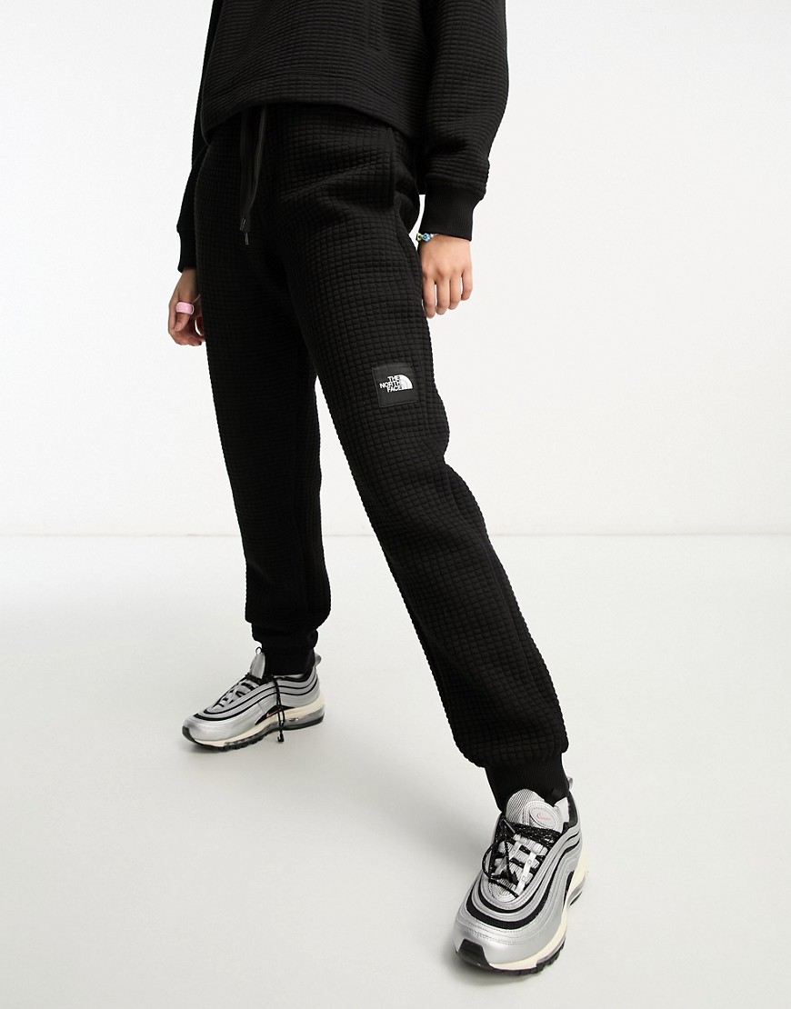The North Face NSE Mhysa quilted joggers in black