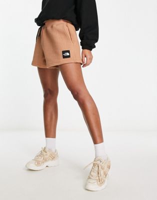The North Face NSE Mhysa quilted high waist shorts in brown - ASOS Price Checker