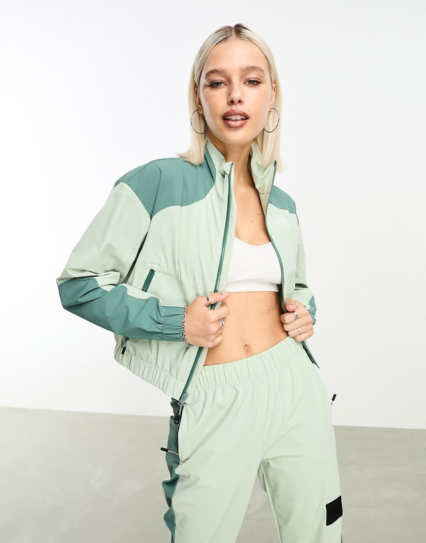 The North Face NSE shell suit track top in sage green