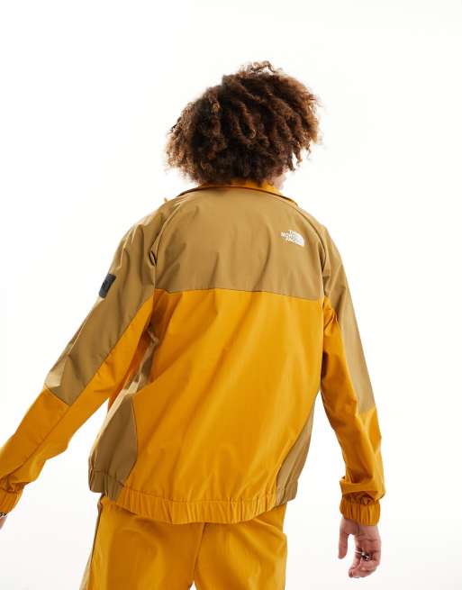 Light yellow north face rain outlet jacket