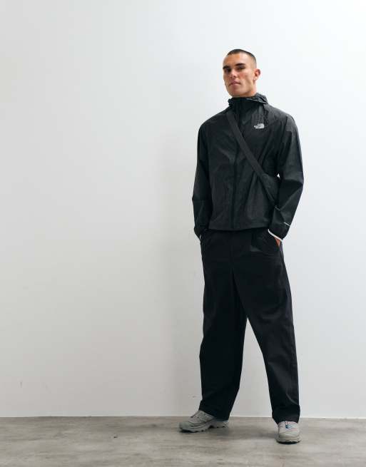 The North Face NSE windbreaker jacket in black, 4 of 5