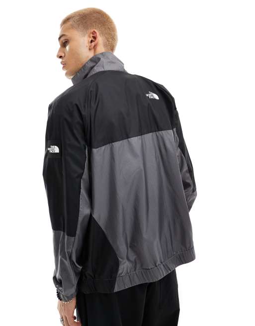 Si-Sa 　お値下げ致しました。THE NORTH FACE シャトル The North Face NSE Windshell zip track top in grey and black