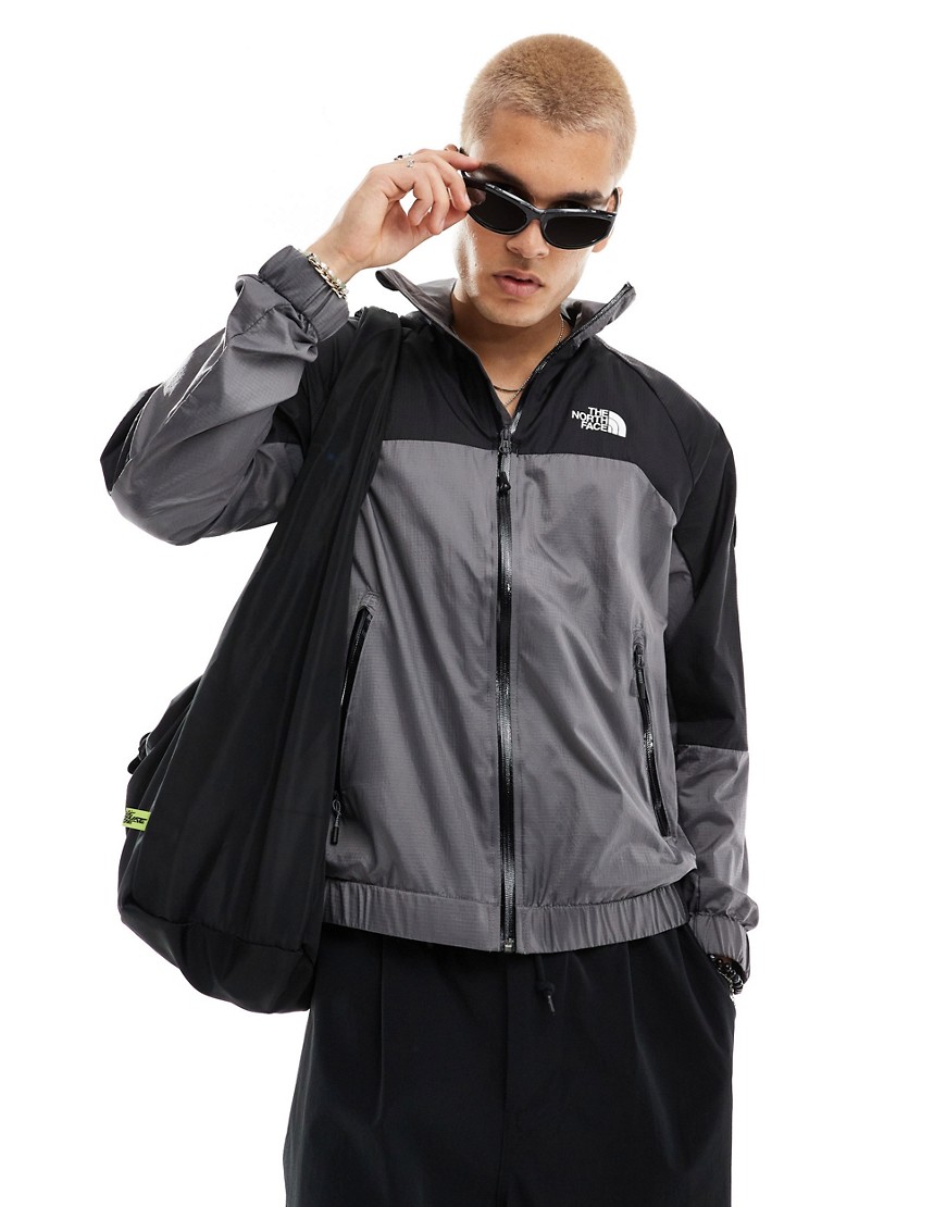 The North Face NSE Windshell zip tracktop in grey and black
