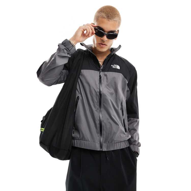 The North Face NSE Windshell zip tracktop in grey and black