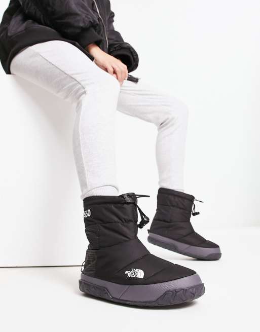 The North Face Nuptse Apres down insulated booties in black | ASOS