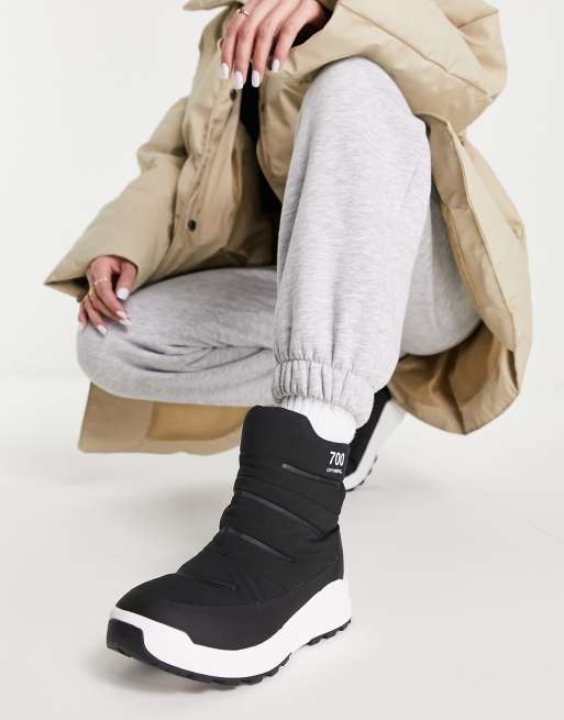 The North Face Nuptse booties in black | ASOS