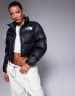 The North Face Nuptse cropped down puffer jacket in black | ASOS