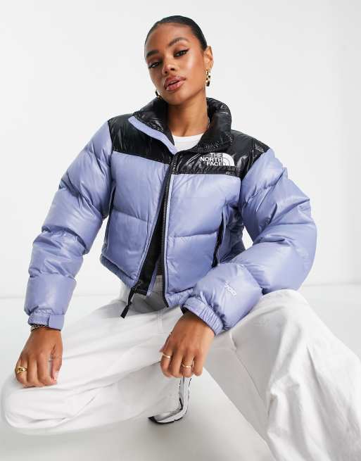 The north face doudoune bleu et noir hot sale