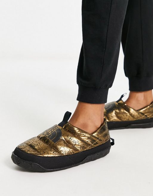 The North Face Nuptse down insulated mules in gold | ASOS
