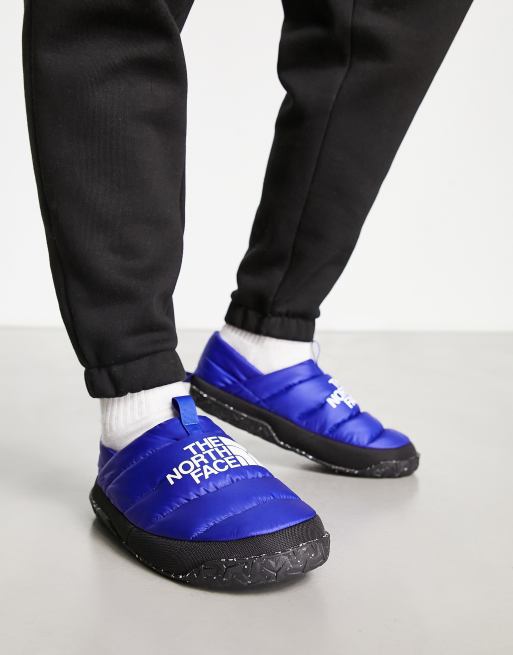 The North Face Nuptse down insulated slip on mules in blue | ASOS