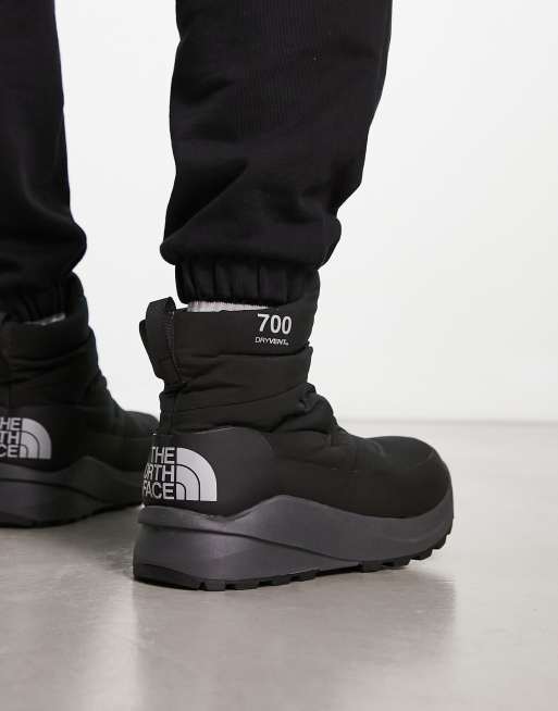 The North Face Nuptse II down insulated waterproof boot in black | ASOS