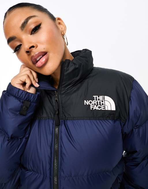 Doudoune the north face bleu et noir sale