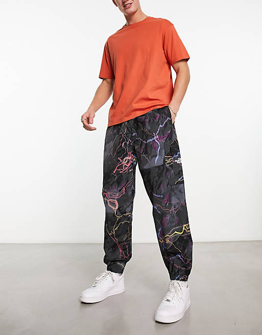 The North Face nylon utility trail glow print sweatpants in black | ASOS
