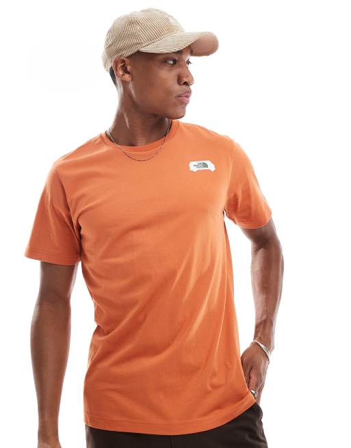 The North Face Outdoor Graphic Tee in orange | ASOS