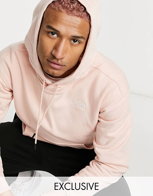The North Face Essential hoodie in pink Exclusive at ASOS