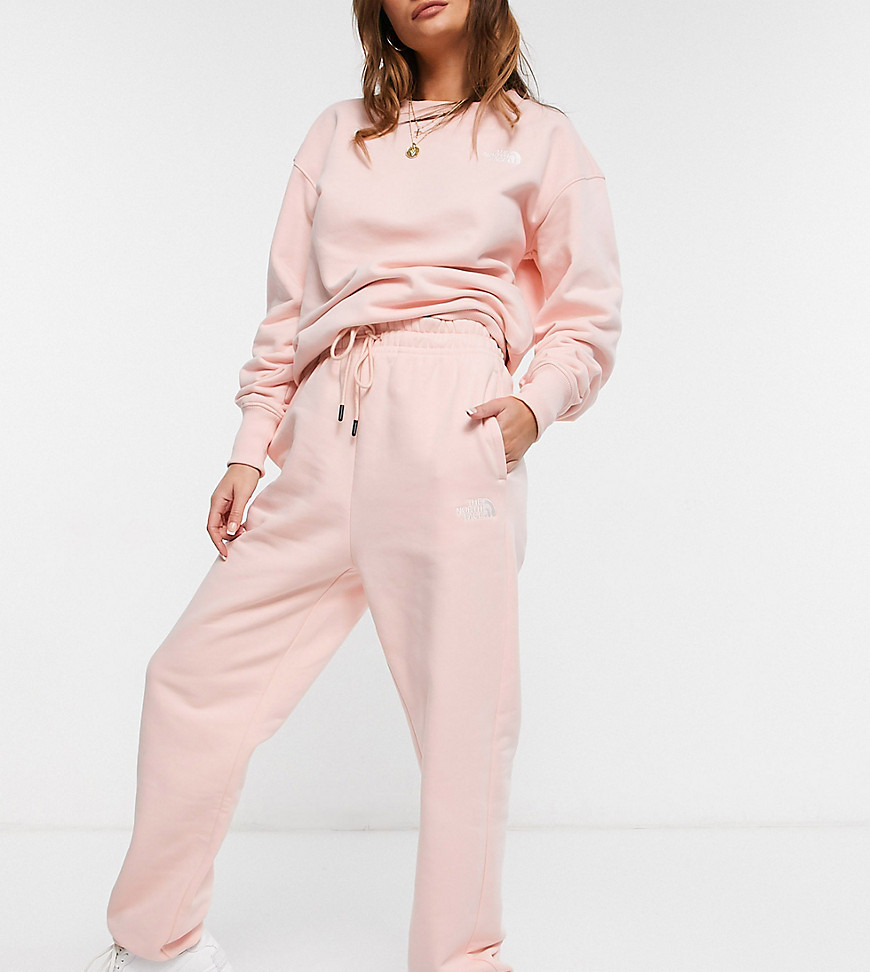 The North Face Oversized Essential jogger in light pink Exclusive at ASOS