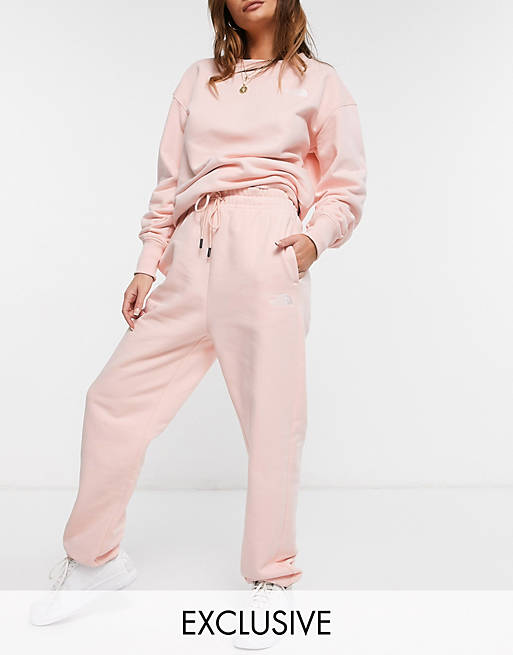 The North Face Oversized Essential jogger in light pink Exclusive at ASOS