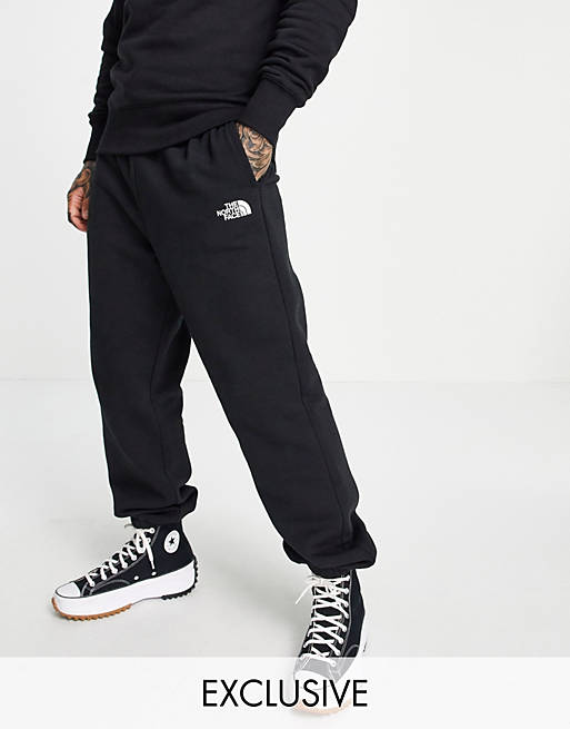 Men The North Face Oversized Essential joggers in black 