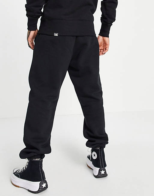 Men The North Face Oversized Essential joggers in black 