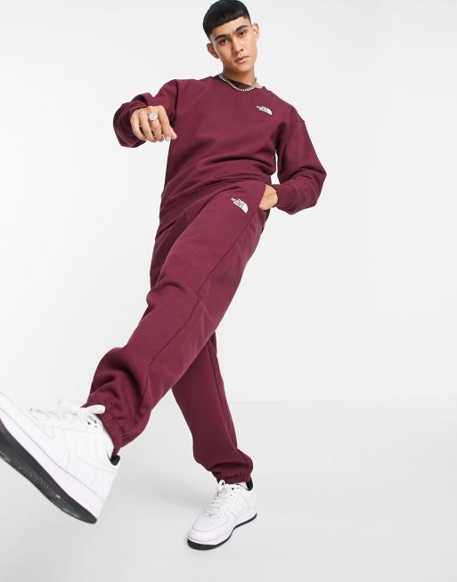 The North Face Oversized Essential joggers in burgundy Exclusive at ASOS