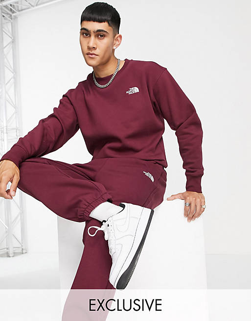 The North Face Oversized Essential joggers in burgundy Exclusive at ASOS
