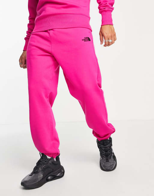 The North Face Oversized Essential joggers in pink Exclusive at ASOS