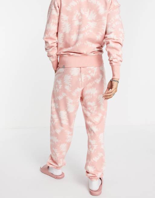 The North Face Oversized Essential joggers in pink tie dye Exclusive at ASOS